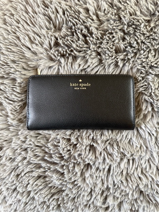 kate spade Handbags - Kate Spade New York Black Leather Zip Around Wallet Spade Lining